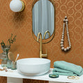 Around the Clock Camel Gold wallpaper in a styled room