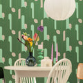 Up and Around Khaki Blue Gold wallpaper in a styled room