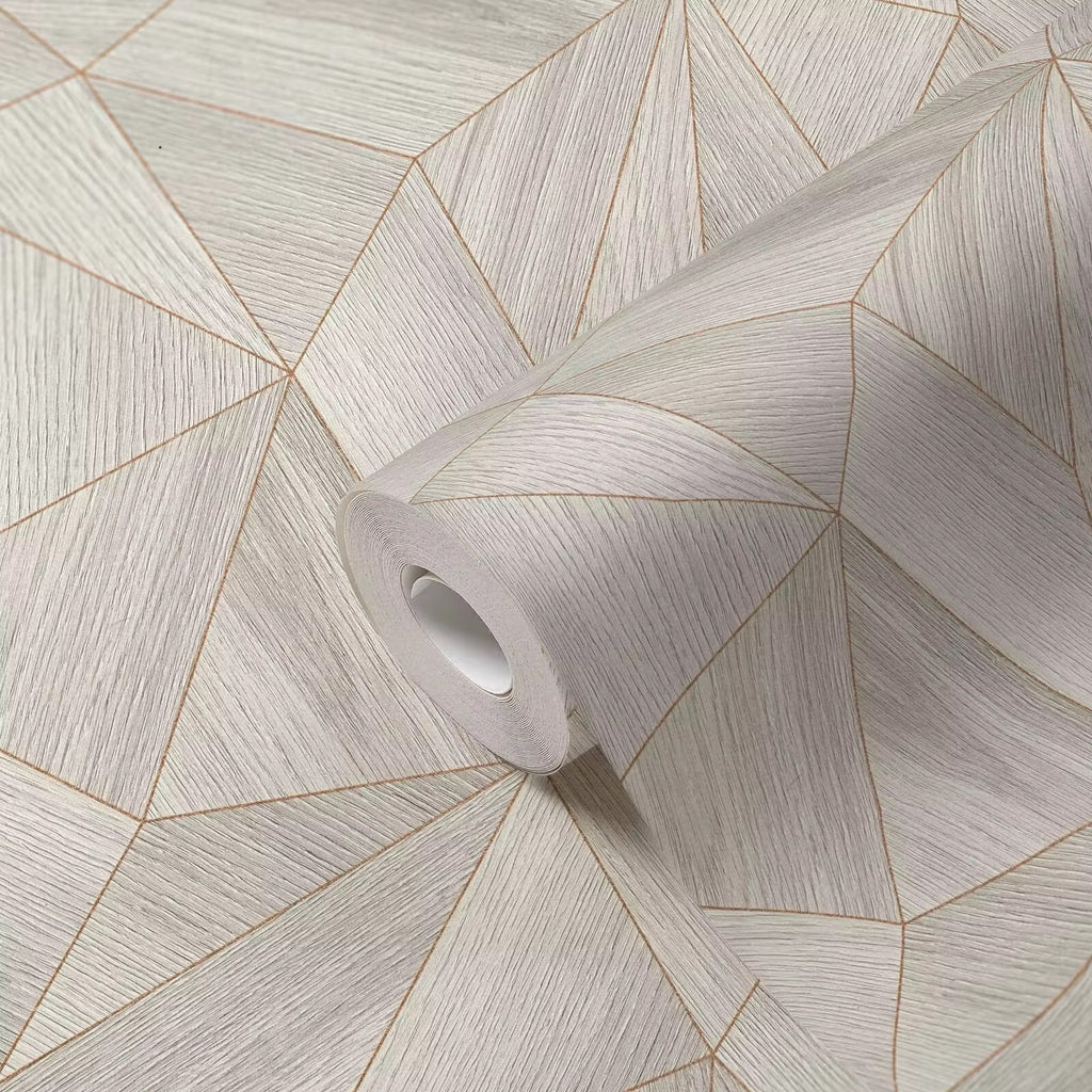 Roll of geometric patterned wallpaper on a matching background