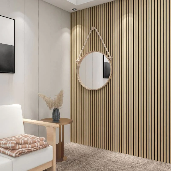 Modern interior with a round mirror on a acoustic slat wall, white chair, and small table.