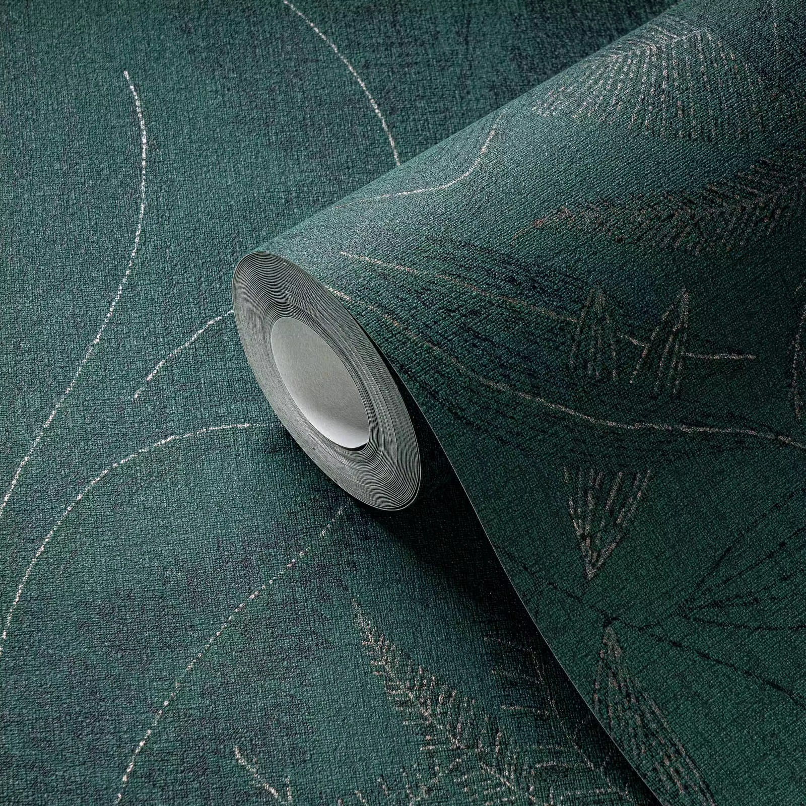 Roll of green textured wallpaper with abstract patterns