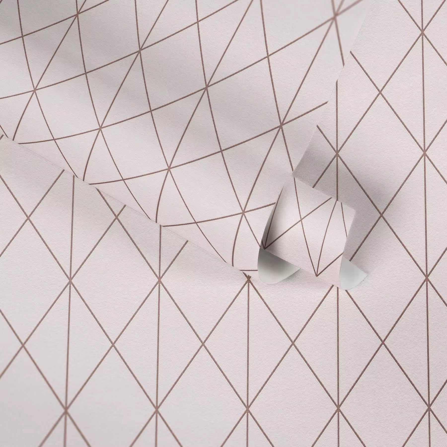 Geometric pattern wallpaper with intersecting lines on a light background. natty and polly, graham and brown, mind the gap