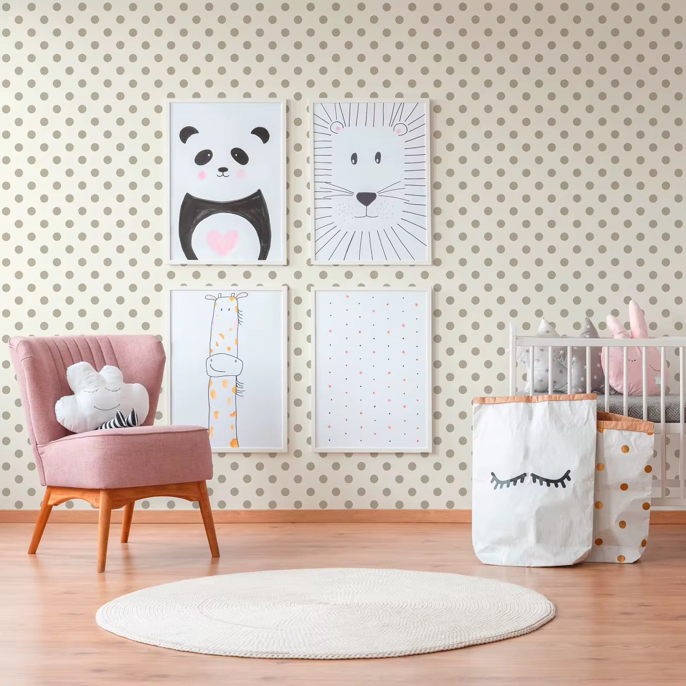 Children's room with crib, chair, and wall art featuring a panda and bear.