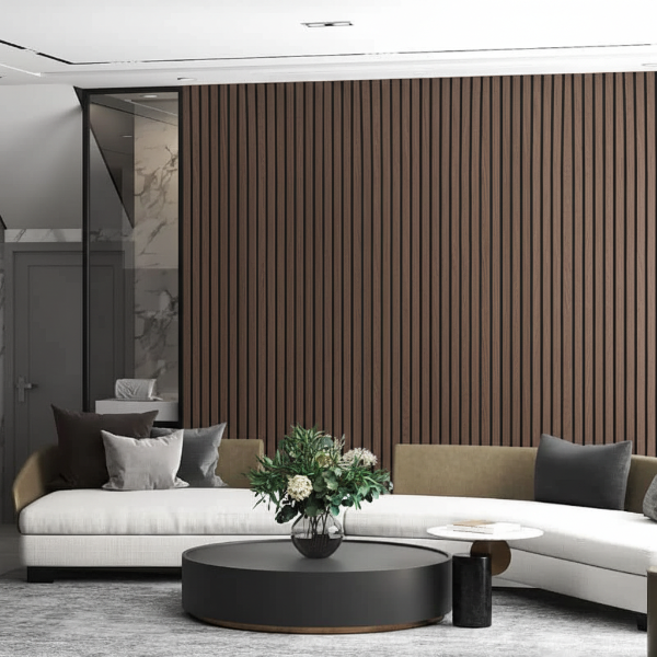 Modern living room with a white sofa, black coffee table, and acoustic slat wall.